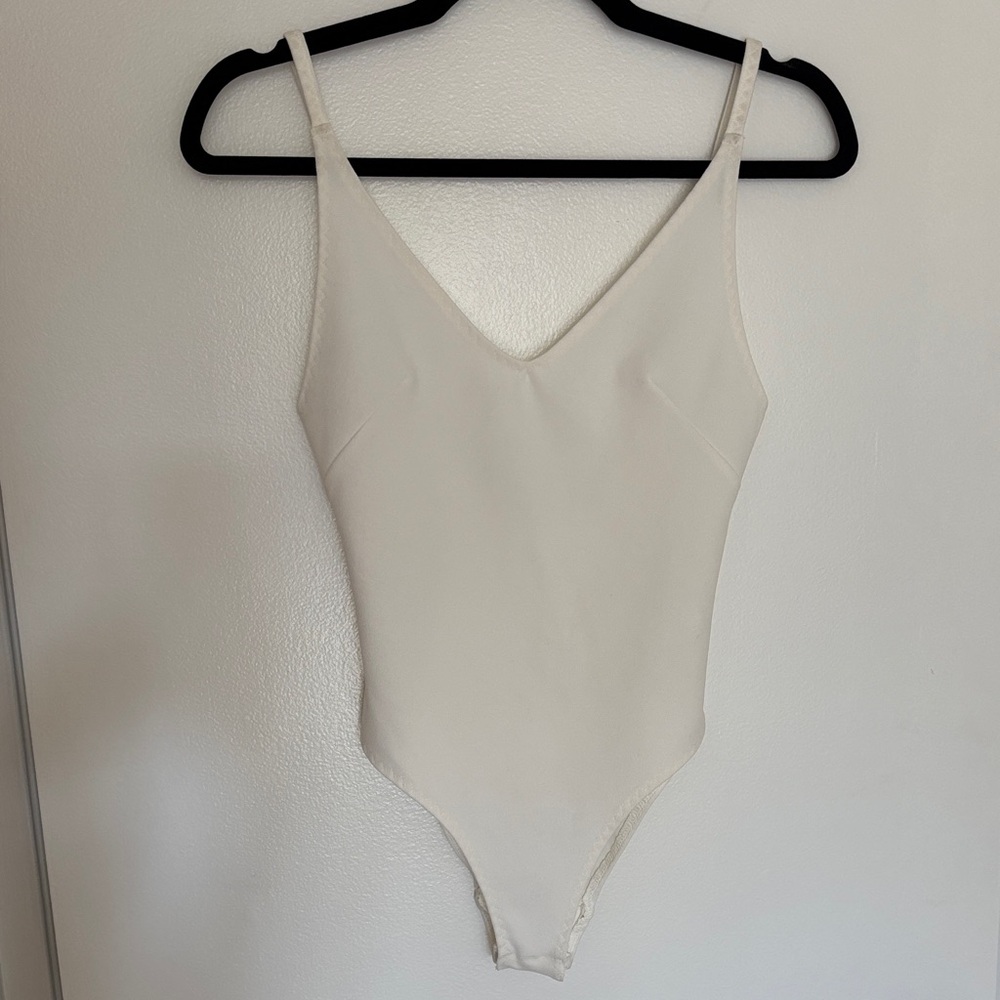 Elegant White Openback Bodysuit